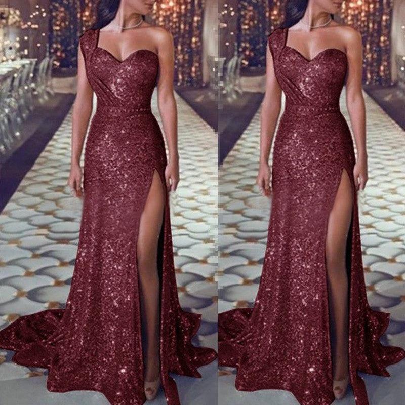 Women's one-shoulder sleeveless bronzing split dress by MANDOTOS, shown on a model with flowing fabric and stylish design.