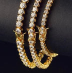 18K gold plated zircon tennis bracelet by MANDOTOS featuring sparkling cubic zirconia stones and a sleek, elegant design.