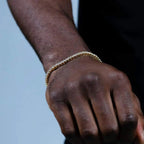 18K gold-plated zircon tennis bracelet by MANDOTOS featuring sparkling cubic zirconia stones and a sleek, elegant design.