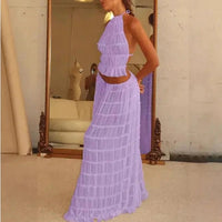 Mandotos 2-piece chic halter dress suit set featuring a stylish halter top and matching skirt on a model.
