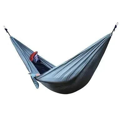 Mandotos Adventure Hammock Pack featuring a lightweight nylon hammock with straps and carabiners for outdoor camping and relaxation.