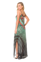 Mandotos Africa long dress featuring vibrant traditional patterns and flowing fabric, perfect for elegant cultural occasions.
