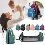 Mandotos all-in-one stroller diaper backpack with multiple compartments and adjustable straps, designed for parents on the go.