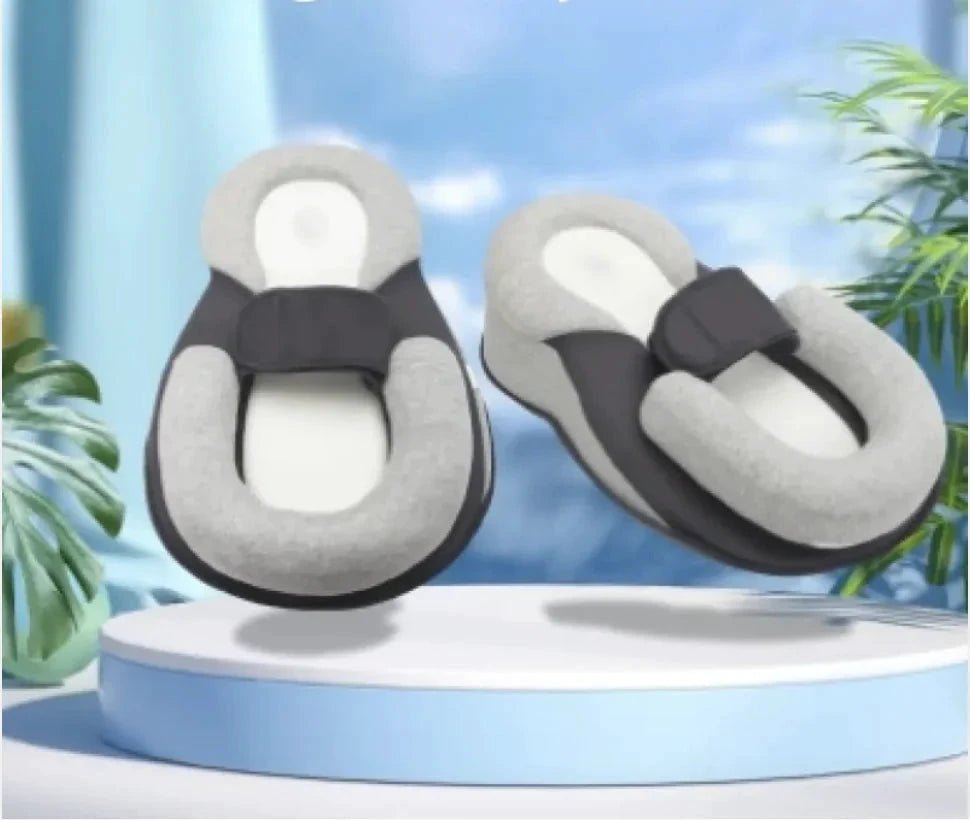 Mandotos baby anti-spit up pillow with soft fabric and ergonomic design to help prevent spit-up during feeding.