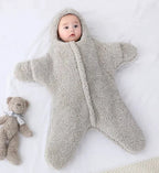Soft baby quilt by MANDOTOS with colorful patterns, perfect for keeping infants cozy and comfortable.