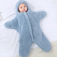 Soft baby quilt from MANDOTOS with colorful patterns, perfect for keeping infants warm and comfortable.