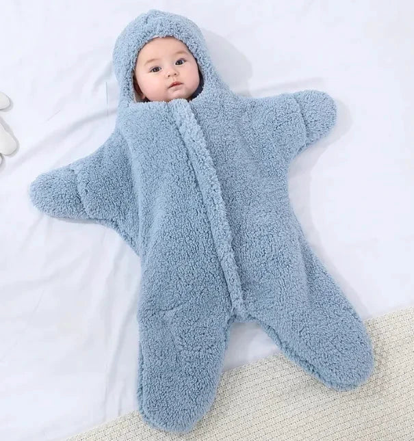 Soft baby quilt by MANDOTOS featuring colorful patterns, perfect for cozy nursery cuddles and gentle warmth.