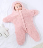 Soft baby quilt by MANDOTOS featuring colorful patterns, ideal for nursery comfort and gentle cuddles.