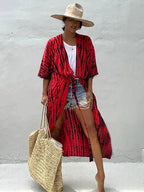 Mandotos Beach Chic Cover-Up worn over swimwear, lightweight fabric, perfect for sun-kissed beach adventures and effortless summer style.
