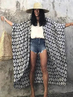 Mandotos Beach Chic Cover-Up featuring lightweight fabric and stylish design, perfect for sun-kissed beach adventures.