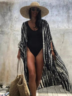 Mandotos Beach Chic Cover-Up with lightweight fabric, stylish design, perfect for sun-kissed beach adventures.