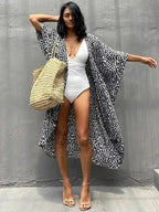 Mandotos Beach Chic Cover-Up with lightweight, flowy fabric perfect for sun-kissed beach adventures and effortless style.