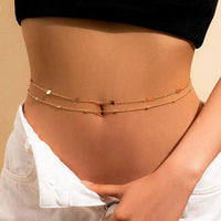 Mandotos Boho Glam belly chain featuring layered gold-toned jewelry with decorative charms and intricate design details.