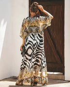 Mandotos Breeze Kimono Dress displayed on a model, featuring lightweight fabric, flowy design, and stylish kimono sleeves.
