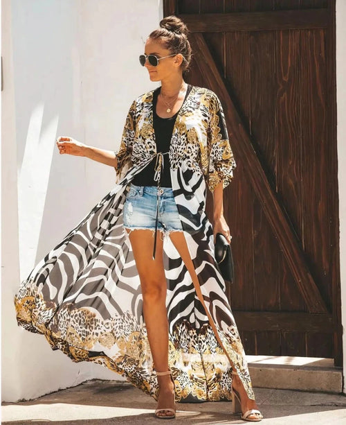 Mandotos Breeze Kimono Dress featuring flowing fabric, wide sleeves, and a relaxed fit perfect for casual summer wear.
