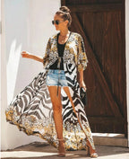 Mandotos Breeze Kimono Dress featuring flowing fabric, wide sleeves, and a relaxed fit perfect for summer wear.