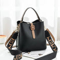 Mandotos Korean style bucket shoulder bag with crossbody strap, fashionable female bag made of durable material.
