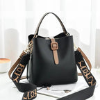 Mandotos Korean style bucket shoulder bag with crossbody strap, fashionable female bag made of durable material.