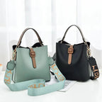 Mandotos Korean style bucket bag with shoulder strap, fashionable cross-border female handbag, black leather design.