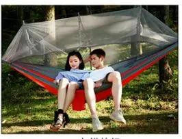 Mandotos bug-free camp hammock for outdoor relaxation, featuring mosquito protection for two people in a natural setting.