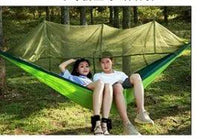 Mandotos Bug-Free Camp Hammock with mosquito protection, designed for outdoor relaxation for two people.