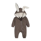 Pink bunny ear baby onesie from MANDOTOS with soft fabric and adorable bunny ear hood, perfect for infants.