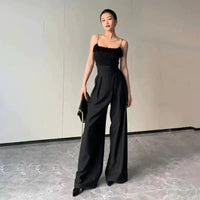 Mandotos chic flowy wide-leg trousers, lightweight fabric, high waist, and relaxed fit, perfect for casual or stylish outfits.