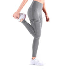 Mandotos chic gold print leggings featuring a stylish gold pattern on black stretchy fabric.