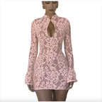 Mandotos chic hollow-out bell sleeve dress with stylish cutouts and flowy fabric, perfect for elegant occasions.