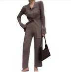 Mandotos chic knit collared ensemble featuring a stylish knit top and matching pants for a modern, sophisticated look.