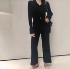 Mandotos chic knit collared ensemble featuring a stylish knitted top and matching pants, perfect for casual or semi-formal wear.