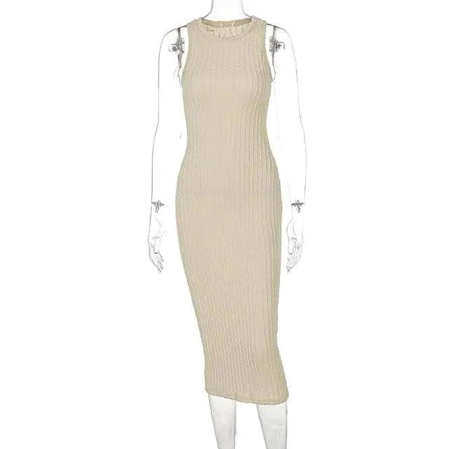 Mandotos chic knitted tank sweater dress featuring a fitted silhouette and cozy wool blend fabric, perfect for stylish winter wear.