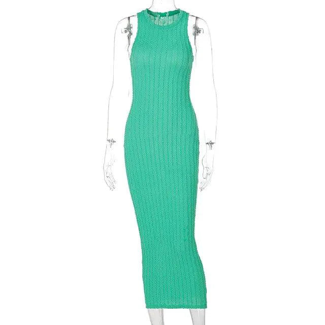 Mandotos chic knitted tank sweater dress displayed on a hanger, featuring a cozy, stylish design in neutral tones.