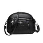 Mandotos chic leather circle purse with adjustable strap and minimalist design, perfect for casual or evening use.