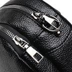 Mandotos chic leather circle purse with a sleek design, featuring a round shape and a stylish finish.