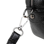 Mandotos chic leather circle purse with a sleek design and top handle, perfect for stylish accessories.