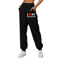 Mandotos Chic Love Print Trousers featuring a stylish love-themed pattern on lightweight, comfortable fabric for casual wear