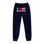 Mandotos chic love print trousers featuring a stylish design, tailored fit, and vibrant pattern for a fashionable look.