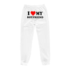 Mandotos chic love print trousers with stylish pattern, featuring a comfortable fit and modern design for casual wear.
