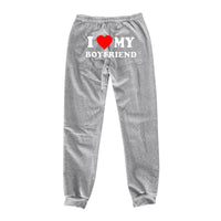 Mandotos Chic Love Print Trousers featuring a stylish heart pattern, slim fit design, and comfortable fabric for casual wear.