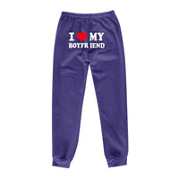 Mandotos Chic Love Print Trousers featuring stylish love-themed pattern, slim fit design, and comfortable fabric for casual wear.