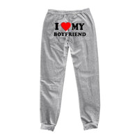 Mandotos Chic Love Print Trousers featuring stylish heart patterns and a comfortable fit, perfect for casual or chic outfits.