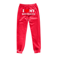 Mandotos Chic Love Print Trousers featuring stylish love-themed pattern and comfortable fit, ideal for casual or trendy outfits.