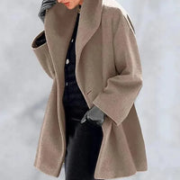 Mandotos Chic Multi-Shade Oversized Cardigan displayed on a model, showing its colorful, relaxed fit and cozy knit fabric.