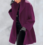 Mandotos chic multi-shade oversized cardigan with relaxed fit, featuring colorful knit pattern and long sleeves.