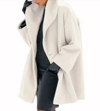 Mandotos chic multi-shade oversized cardigan featuring soft knit fabric and relaxed fit, displayed on a neutral background.