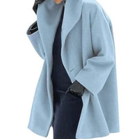 Mandotos oversized cardigan with multi-shade knit, featuring a relaxed fit and cozy design in a stylish, chunky style.