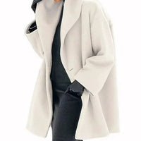Mandotos chic multi-shade oversized cardigan with relaxed fit, featuring colorful knit pattern and cozy fabric.