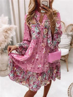 Mandotos chic pleated long sleeve dress featuring a flowy silhouette and elegant design, perfect for stylish occasions.