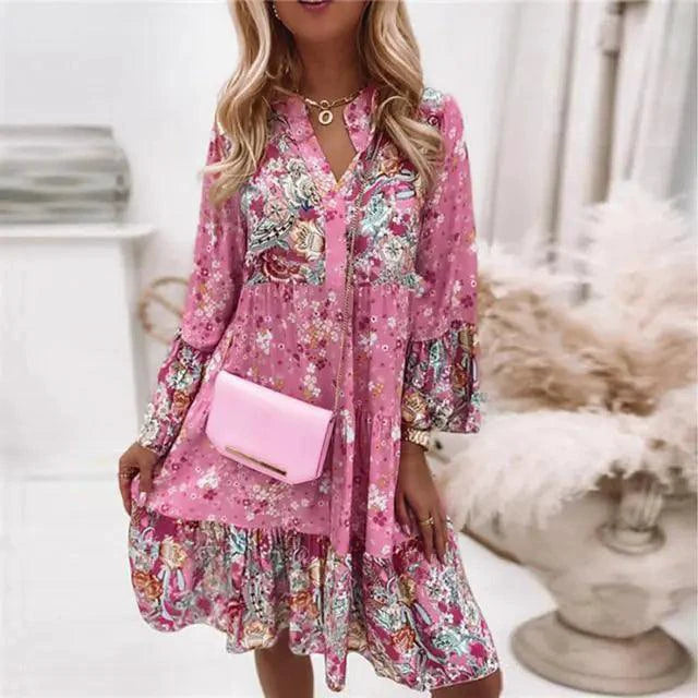 Mandotos chic pleated long sleeve dress with elegant design, featuring flowing pleats and a stylish silhouette.
